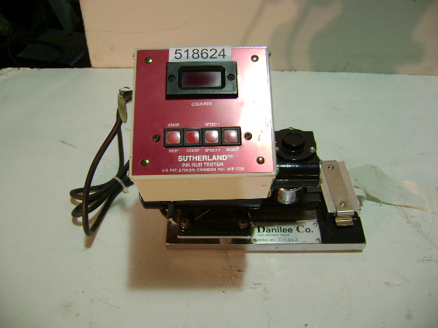 Sutherland Ink Rub Tester - 110 V, comes with digital display, 2 speeds. This is the modern red display. The motor driven tester moves the weight through an arc over a printed specimen.