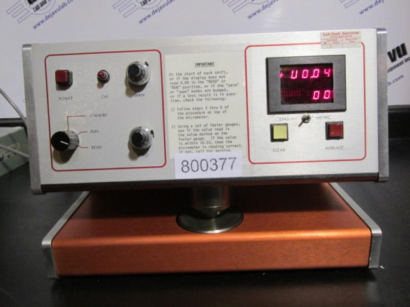 TAPPI Digital Caliper - The Emveco model 200-A Microgage provides accurate, repeatable, high resolution caliper measurements for the paper and plastic film industries. Up to 1024 measurements taken over the surface area of the sample sheet(s) are displayed and evaluated for high, low, average, and standard deviation. The press of a button calculates and displays each of these numbers on a large, five-digit LED display. The 200-A Microgage provides caliper measurements in accordance with TAPPI T-411 and Canadian D.4 standards. Featuring simplicity and ease of use, the 200-A Microgage is designed and built to function in production environments as well as research labs. Sturdy and vibration resistant, it produces repeatable measurements to an accuracy of /- 20 micro inches ( /- 0.5 microns).