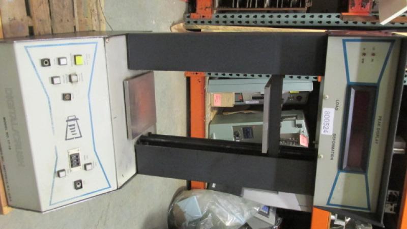 Compression Crush Tester - 7 x 7 platen size. Peak load and deformation are digitally displayed.