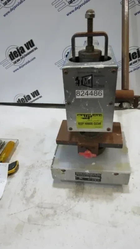 Manual Dic Cutter - The TMI/DGI Hand Expulsion press is used to cut samples with any number of quick change dies. It is safe, efficient, and effective. It is equipped with a 2.905 inch diameter die, but we have many dies in stock that will fit it. Smaller dies from NAEF cutters are compatible. 